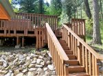 Stairs to back deck with hot tub